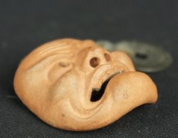 Netsuke demon Koban 1880