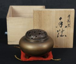 Minimalist bronze Koro 1950