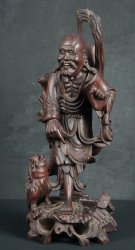 Wood carving deity 1900s