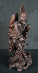 Wood carving deity 1900s