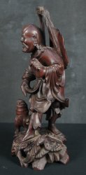 Wood carving deity 1900s