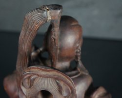 Wood carving deity 1900s
